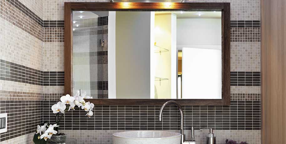 The Large Mirror Trick for Small Bathrooms